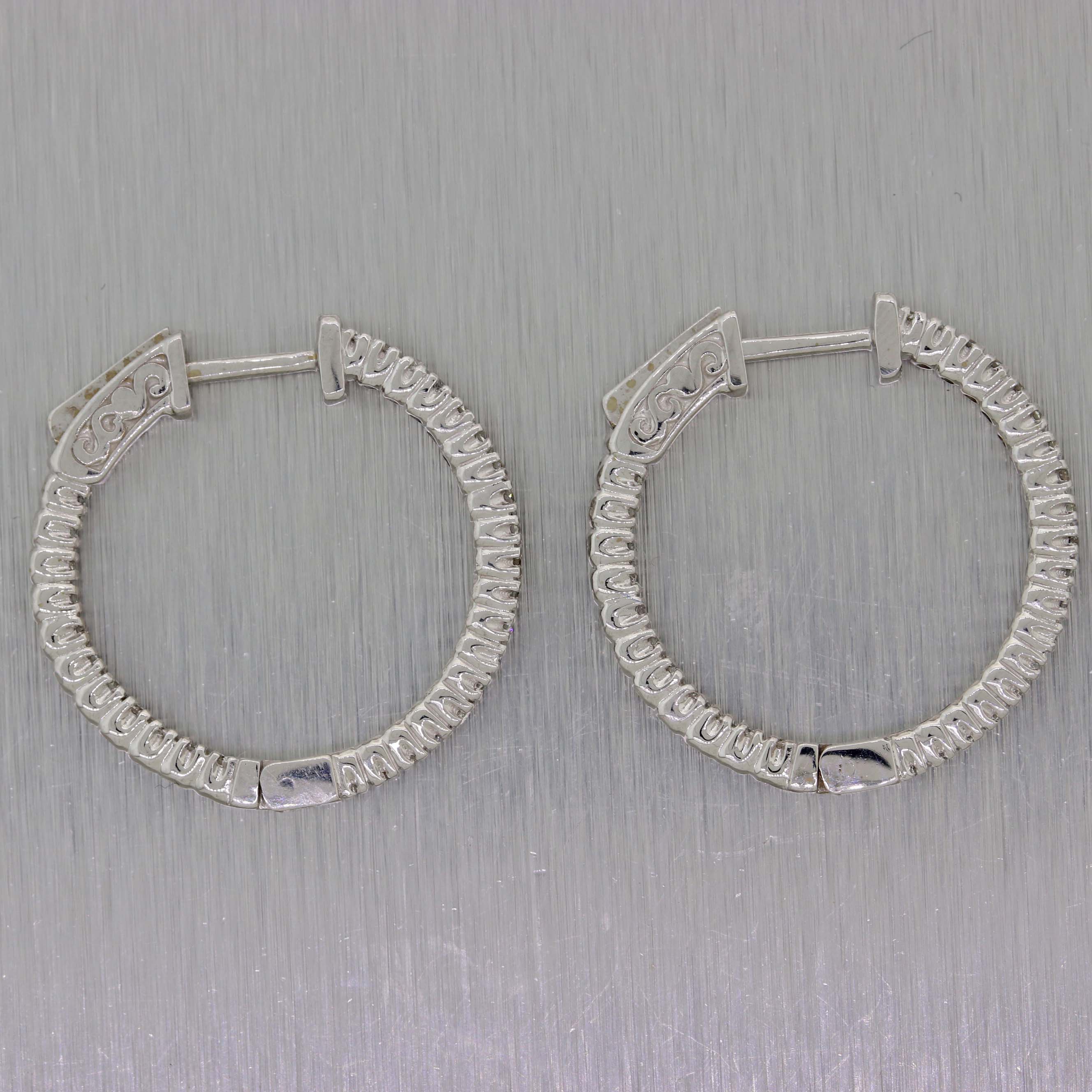 Ladies 14K White Gold .71ctw Diamond 24mm In-Out Hoop Earrings