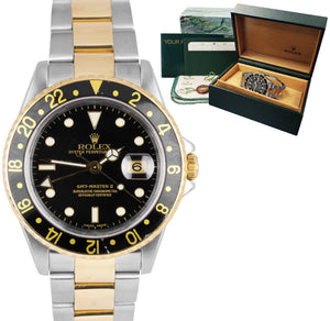 2001 Rolex GMT-Master II 16713 Two-Tone Black 18K Stainless Gold Oyster Watch